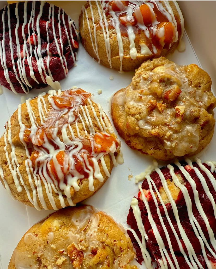 Red velvet, peach cobbler and pecan praline cookies with white chocolate drizzle